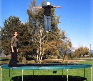 Kids jumping on rental trampoline